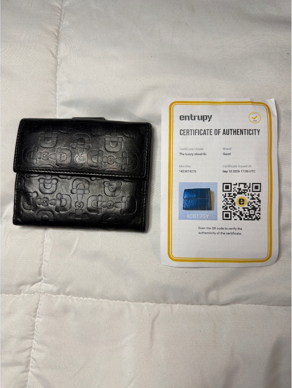 Gucci Black Leather Wallet with Signature GG Pattern